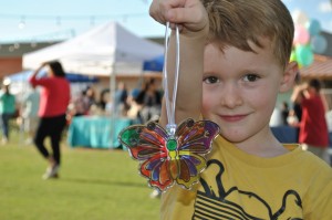 boy holding suncatcher